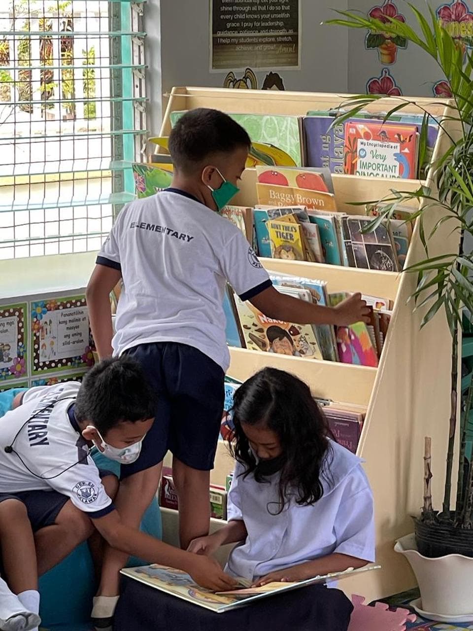 Children reading books at a Reading Nook