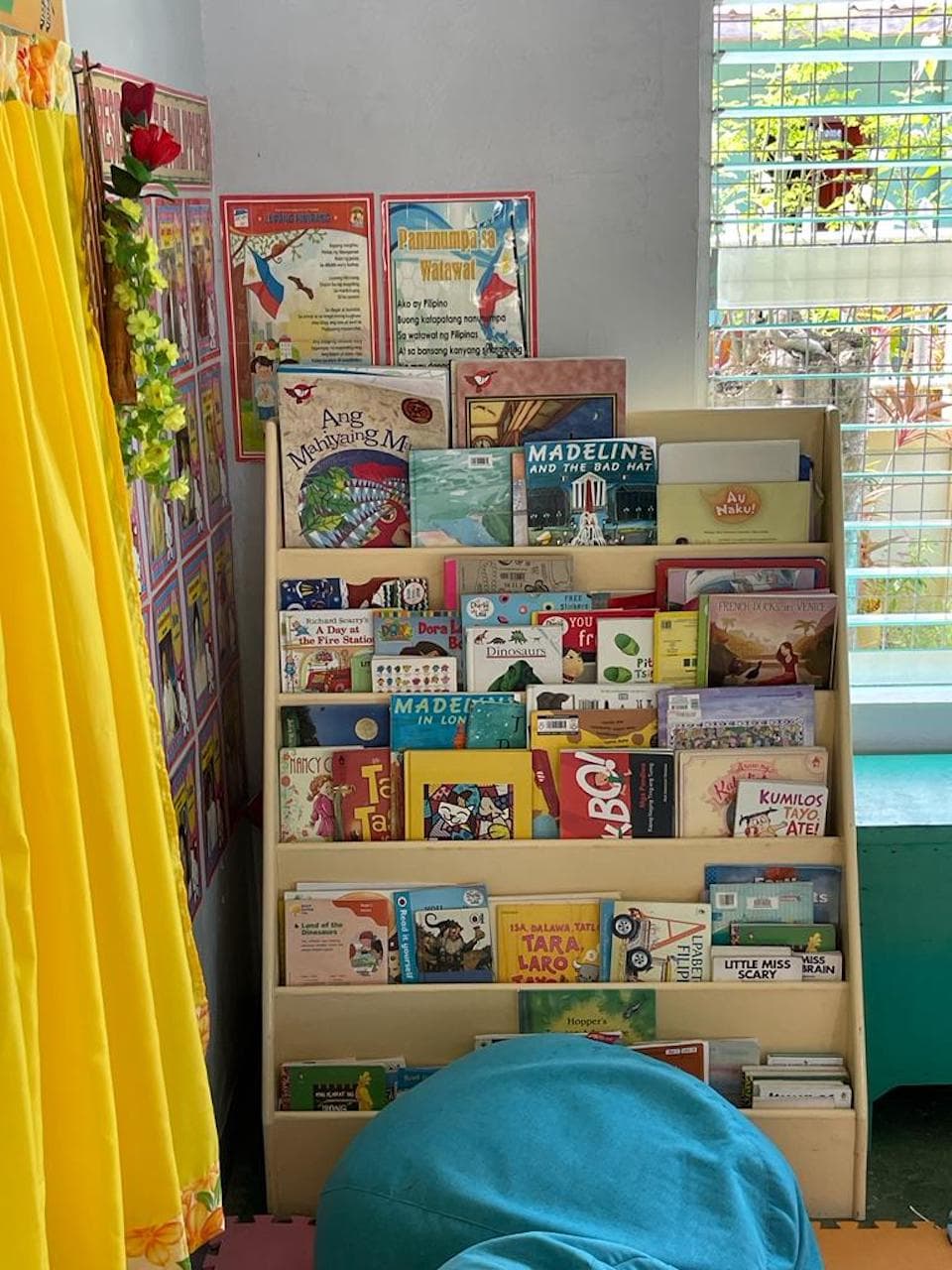 One of Natalia's Reading Nooks - a book shelf lined with children's books